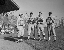 Smokey Joe Wood stands three sons who play various college teams Old Photo