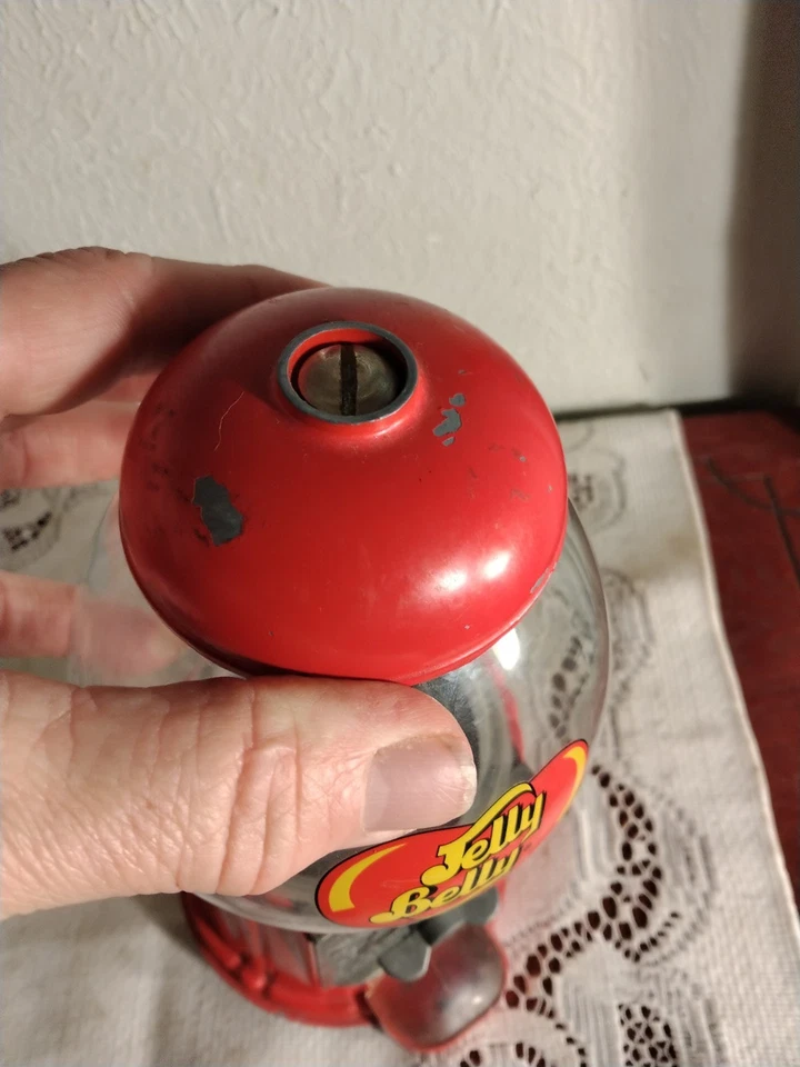 Dispensador confitado vintage de metal fundido y vidrio gelatina roja para vientre gominola funciona Foto 3 de 4