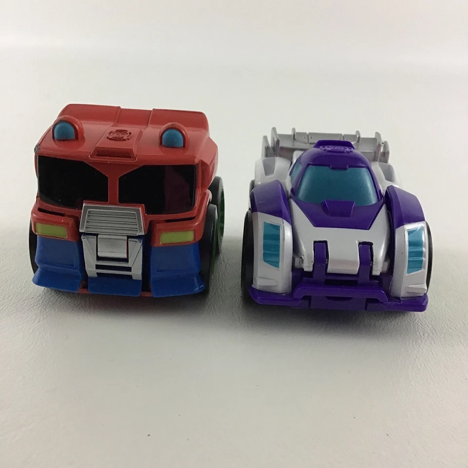Lote de figuras Playskool Heroes Transformers Flip Racers Optimus Prime Blurr 2,5" Foto 2 de 4