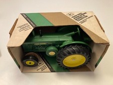 Ertl John Deere model R collectors edition series 1/16 tractor. Mint in box.