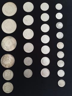 Lot de monnaies en argent . Franc et Centime .
