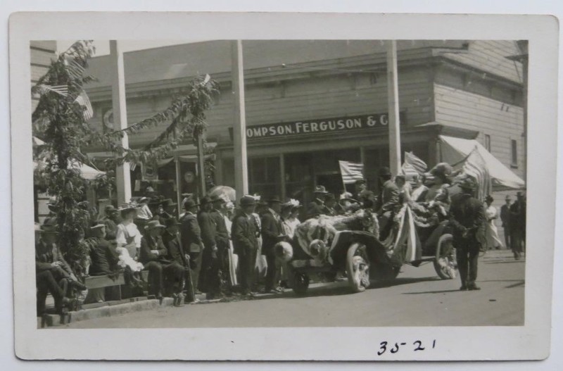 c1915 RPPC Parade Downtown Arcata or Eureka July 4 Flags Auto Flower Decorated