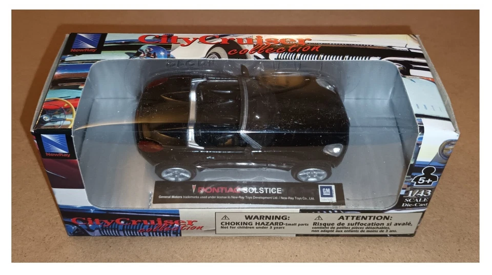 Pontiac Solstice nera modellismo NEW RAY 1:43 City Cruiser die cast metal - Immagine 2 di 2