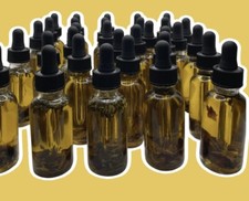 Breast firming and enhancement oil
