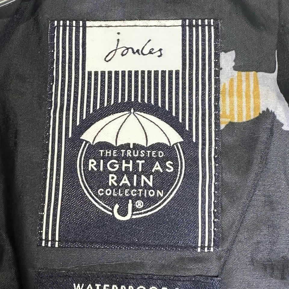 Chaqueta de lluvia con capucha con estampado de perro Joules Right As Rain 12 azul marino cremallera completa para mujer Foto 2 de 4