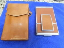 POLAROID SX 70 INSTANT FILM CAMERA,COMES WITH TWO LEATHER POLAROID CASES,TESTED