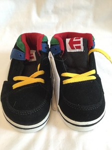 black and yellow etnies