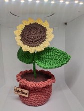 A pot with a sunflower made entirely of crochet, handmade Very beautiful and ele
