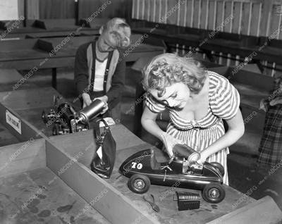 45bx02-83 Marie Wilson tunes up gas powered midget racecar slot car