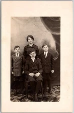 Postcard Sister and 3 Brothers Dapper Portrait RPPC Well-Dressed 1907-1920s Kv