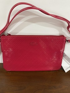 lacoste flat crossover bag