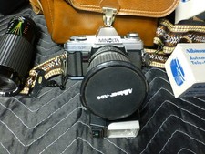 Minolta X-370 35mm film camera w/Two Lenses and accessories