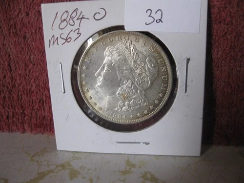 1884 O MORGAN SILVER DOLLAR LIGHT TONEING BU++