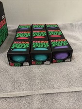 Lot Of 9 NeeDoh Funky Pup Squeeze Ball Super Squish w/Display Box is ripped