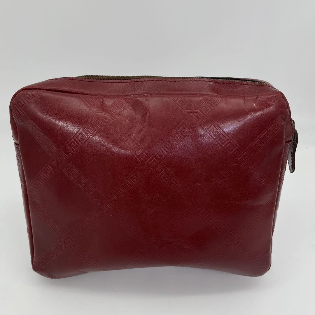 Pochette Yves Saint Laurent in pelle rossa con logo in rilievo autentica unisex