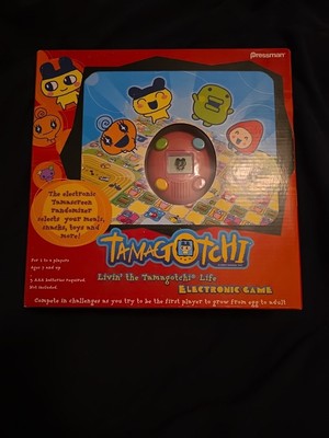 RARE Livin the Life Orange Tamagotchi Electronic Board Game 2007 Bandai Pressman