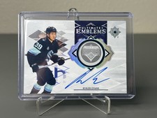 2023-24 Upper Deck Ultimate Ryker Evans Ultimate Emblems Rookie Autograph UE-RE