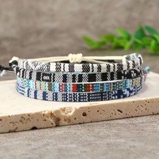 Set Di 4 Braccialetti Fantasia In Corda, Colori Blu, Nero, Beige