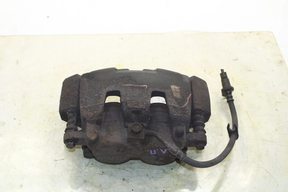 Pinza de disco de freno delantera izquierda Laramie 2012-18 RAM 1500 doble cabina 68157611AA Foto 4 de 4