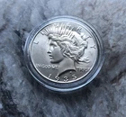 1935 SILVER PEACE DOLLAR IN BU CONDITION.