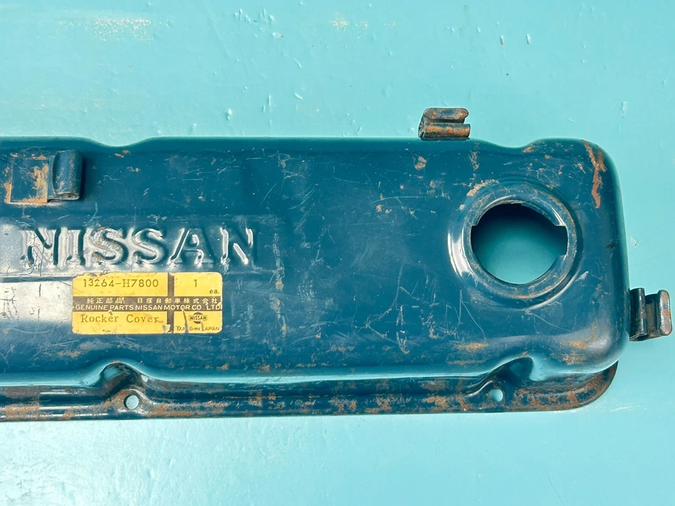 Cubierta de válvula basculante Nissan Datsun B120 B210 B310 13264-H7800 genuina nueva de stock Foto 3 de 4