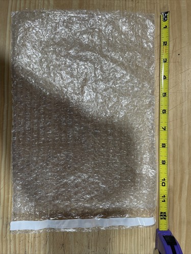 50 Plastic Protective Bags 11.5” x 8”.  Bags Have Self Adhesive Strip On End.