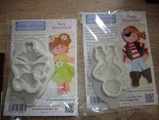 Four Katy Sue character moulds