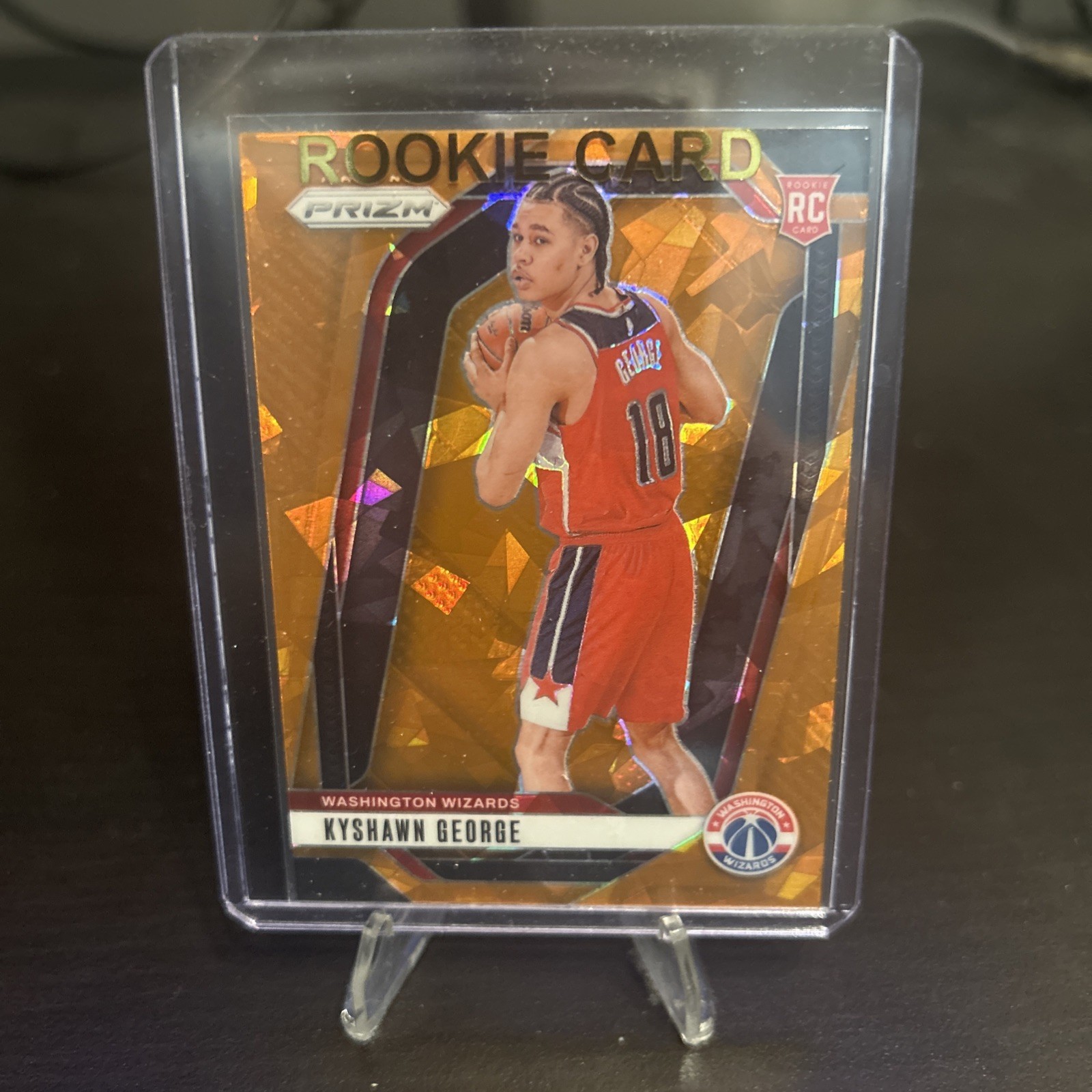 2024-25 Panini Prizm - Kyshawn George #257 Orange Ice Prizm (RC)