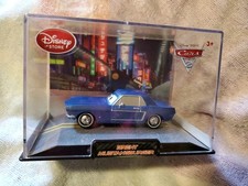 Disney Cars 2 BRENT MUSTANGBURGER Estuche de Coleccionista Tienda Disney