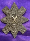 Genuine WW1 The Black Watch (Royal Highlanders) Lacessit WM Cap Badge w/lugs