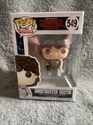 Funko Pop! Vinyl: Stranger Things - Dustin Henderson (Ghostbusters) #549