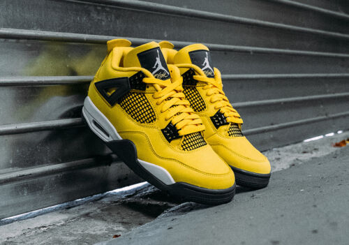 black and yellow air jordan 4