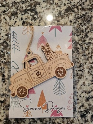 German Shephard in truck laser cut wooden ornament