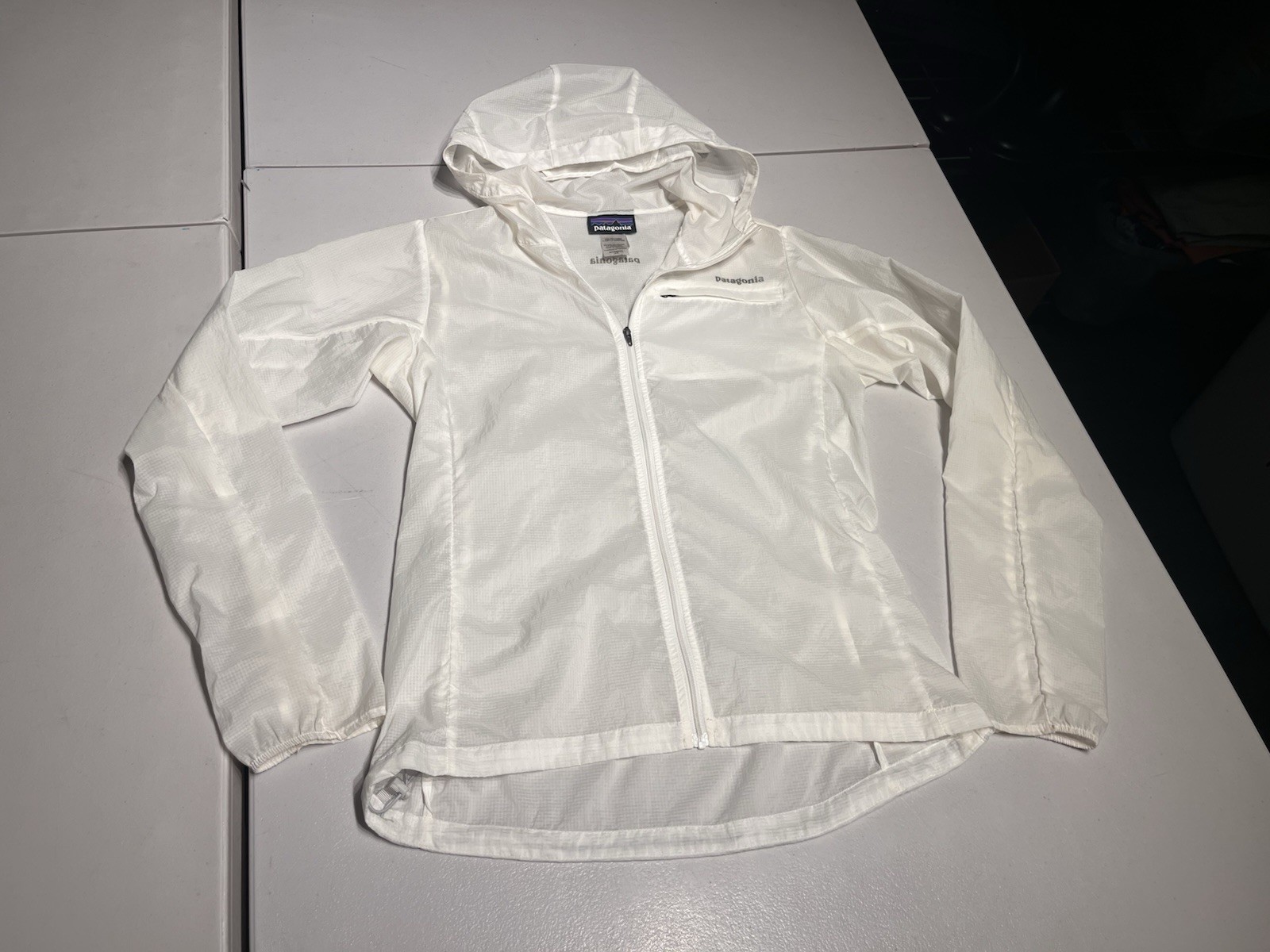 Patagonia Jacket Women's XS White Houdini Thin Coat Hiking Outdoor Hooded Nylon