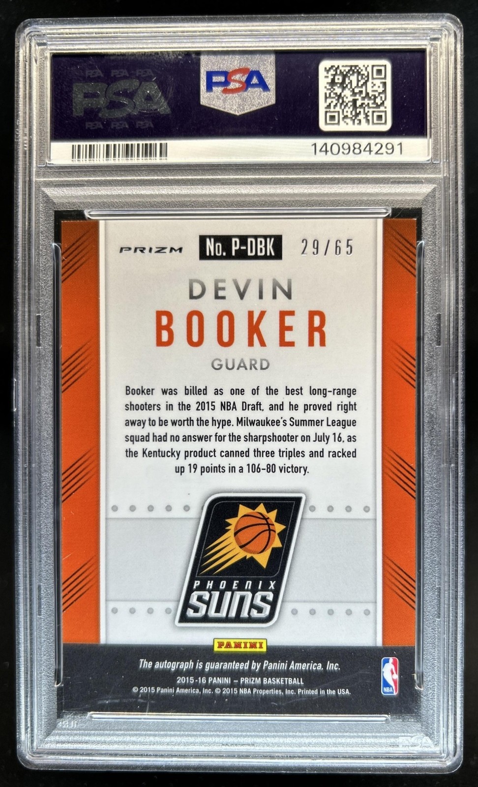 2015-16 Panini Prizm Devin Booker Auto Orange RC Rookie #/65 Suns PSA 9 view 2