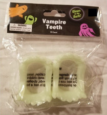       NIP       Halloween Glow In The Dark Vampire Fangs       10 Count       