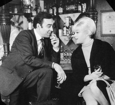 Richard Johnson sits at a bar with Diana Dors in the film Danger R- Old Photo
