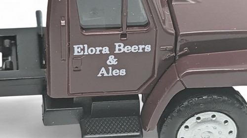 TAYLOR & BATES BREWERY, ELORA BEER, INTERNATIONAL, SEMI TRACTOR TRAILER by Herpa - Picture 10 of 22