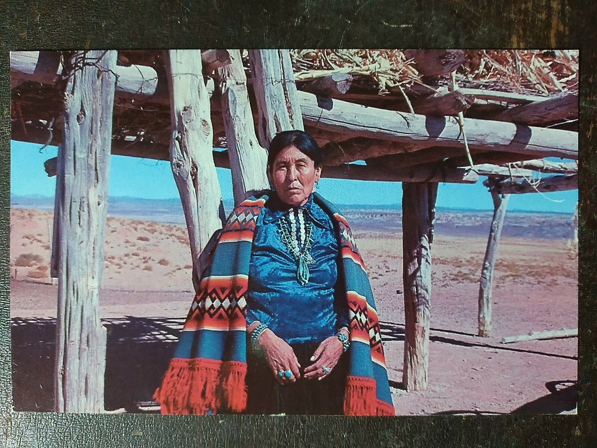 Navajo Woman dressed in her traditional & very colorful clothing