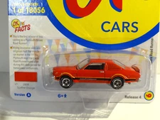 JOHNNY LIGHTNING - SPITFIRE ORANGE - 1976 PLYMOUTH VOLARE ROAD RUNNER