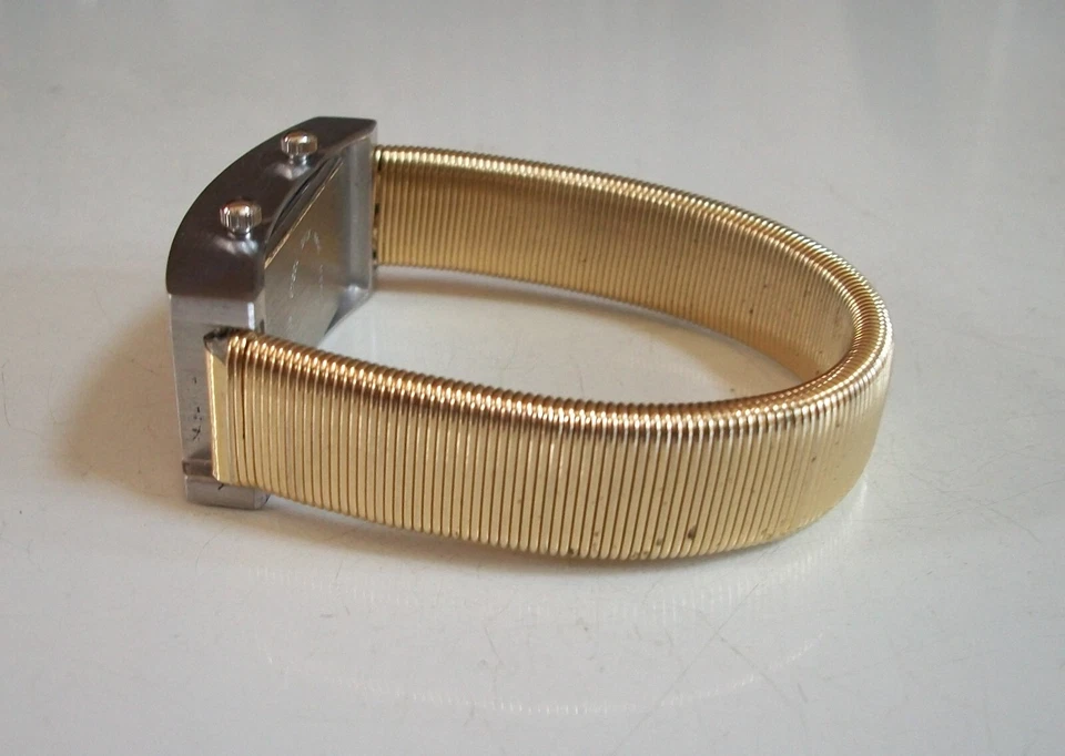 Reloj de moda mujer correa elástica acabado plata y oro doble hora (2 zona horaria) Foto 4 de 4