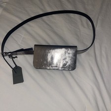 Borsa AllSaints Beckie cintura peltro pelle nichel opaca nuova con etichetta $139