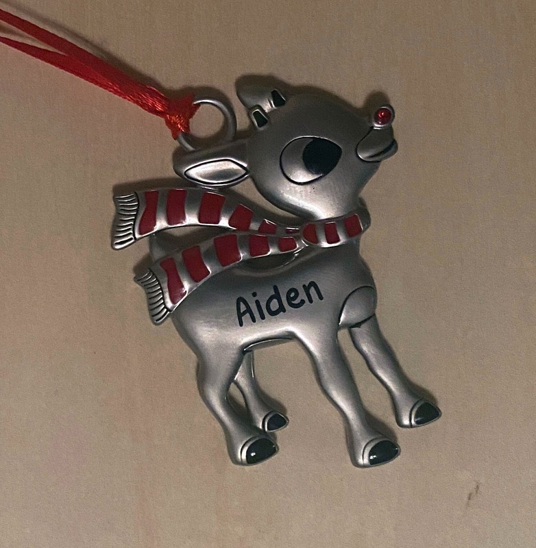 Raindeer Ornament under license to Character Arts, LLC. with Aiden personalized