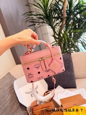   The Cognac Box Bag features the classic Vis...