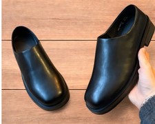 Faux leather slip on loafers shoes in black.