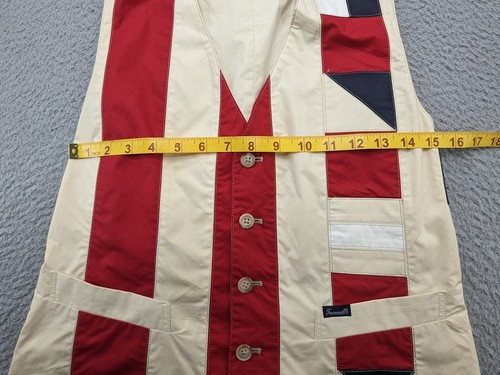 Navy, white, and red Faconnable vest women’s medium with gold star design, button front, and two front pockets.