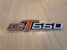 Genuine SUZUKI GT550 1972 to 1977 side panel Glitter Badge