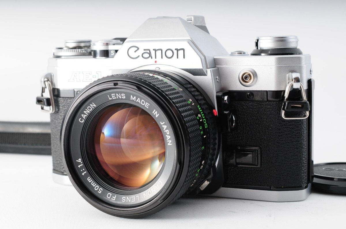N Mint Canon AE-1 SLR Film Camera + NFD New FD 50mm f/1.4 N Mint Canon AE-1 SLR Film Camera + NFD New FD 50mm f/1.4