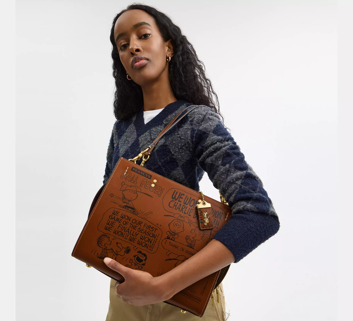 COACH PEANUTS バッグ COACH x PEANUTS LIMITED EDITION HAZELNUT NEWSPRINT SNOOPY