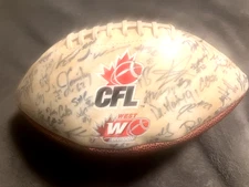 2006 CALGARY STAMPEDERS CFL FOOTBALL AUTOGRAPHED FOOTBALL, 53 AUTOGRAPHS: BURRIS